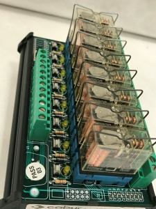 CABUR R08124, modul 8x relé 1P 250V 10A AC, ovládání 24V DC, testovací tlačítka  